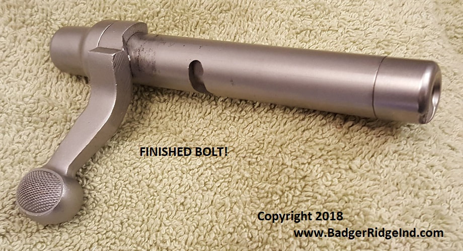 Remington 700 bolt with Badger Ridge 209 conversion
