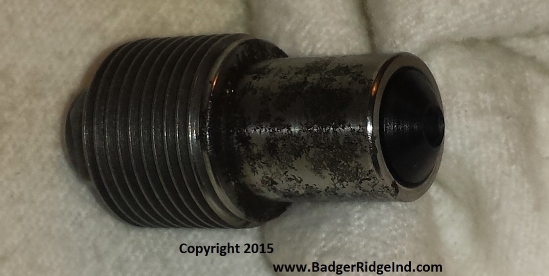 Neglected corroded breech plug