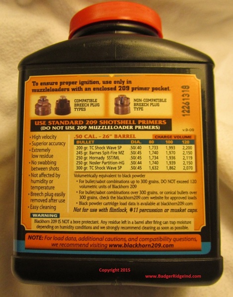 Back of Blackhorn 209 bottle with load data and warning about non sealed breech plugs